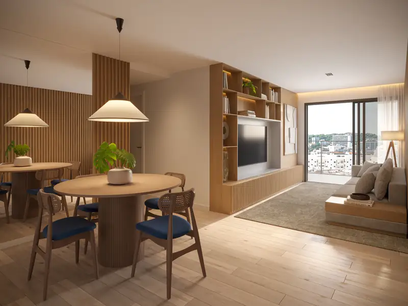 Living integrado com varanda, decorado em tons neutros, destacando o porcelanato de grandes formatos e integração de ambientes.